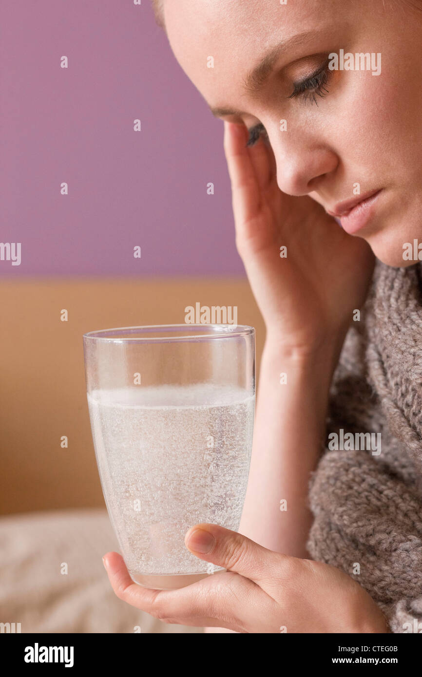 Woman drinking aspirin Stock Photo Alamy