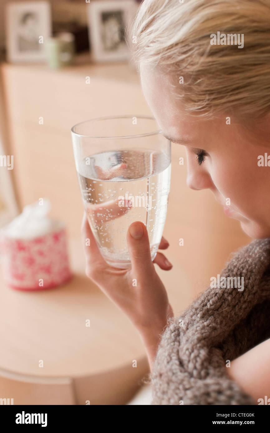 Woman drinking aspirin Stock Photo Alamy
