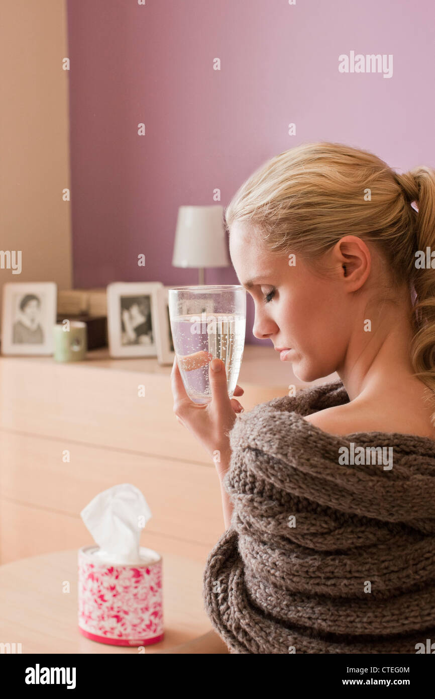 Woman drinking aspirin Stock Photo Alamy
