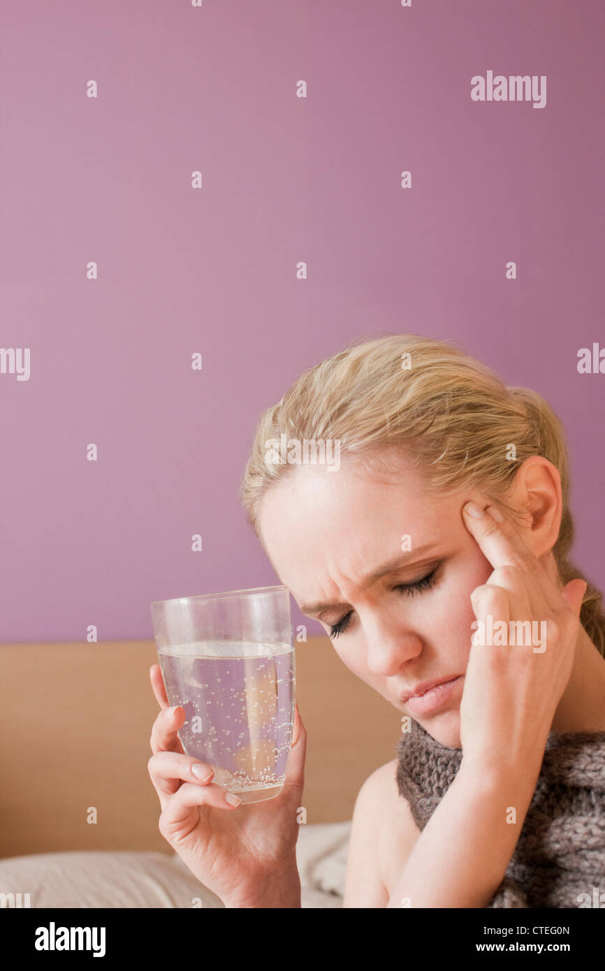 Woman drinking aspirin Stock Photo Alamy