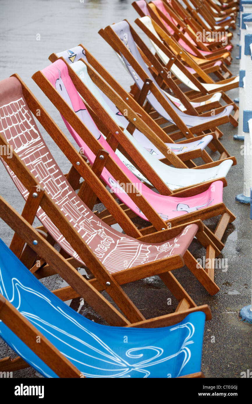Weymouth Esplanade is decorated with 500 deckchairs, deck chairs, designed by locals at Weymouth