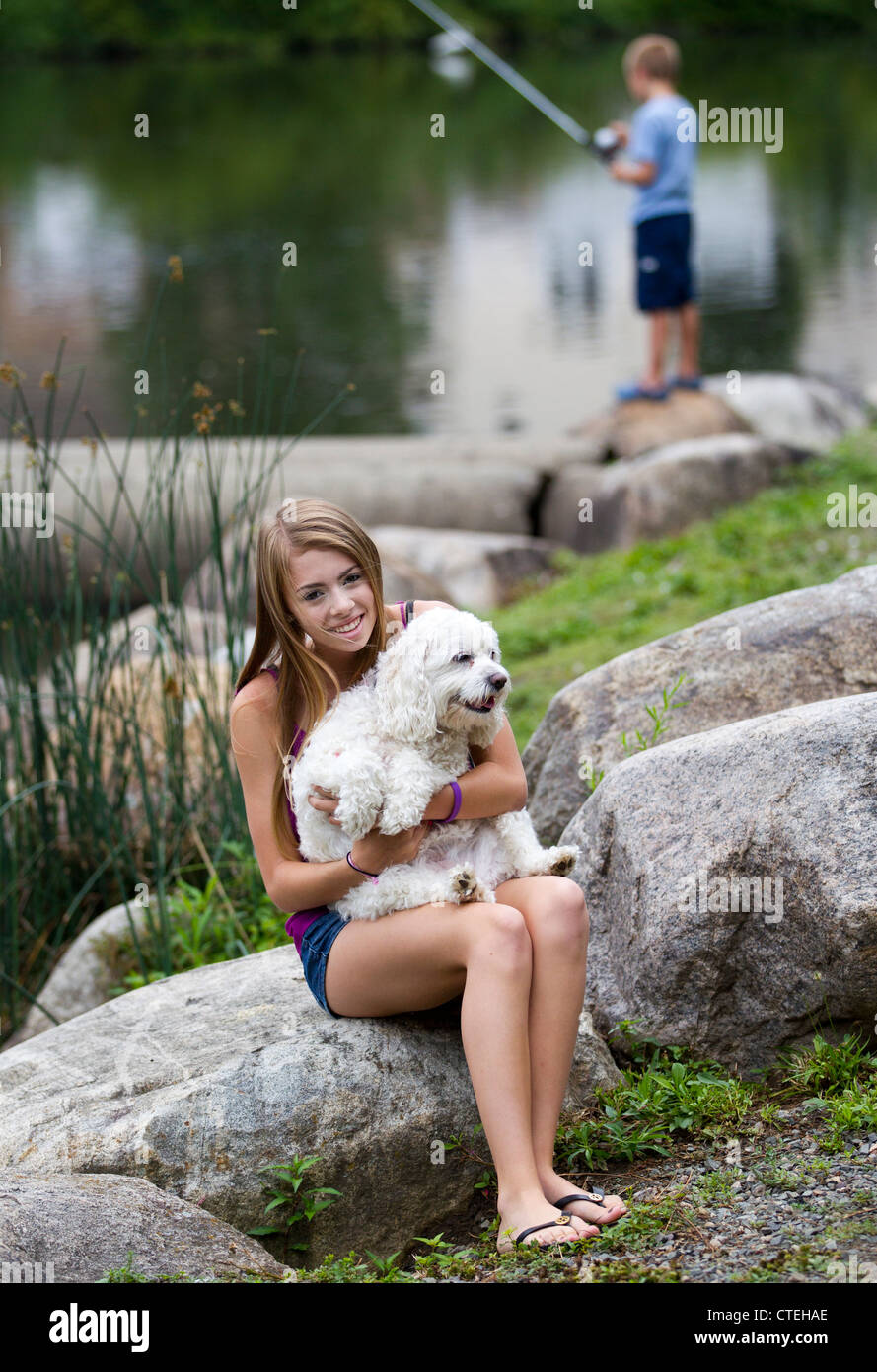 Teenage girl and her pet dog Stock Photo - Alamy