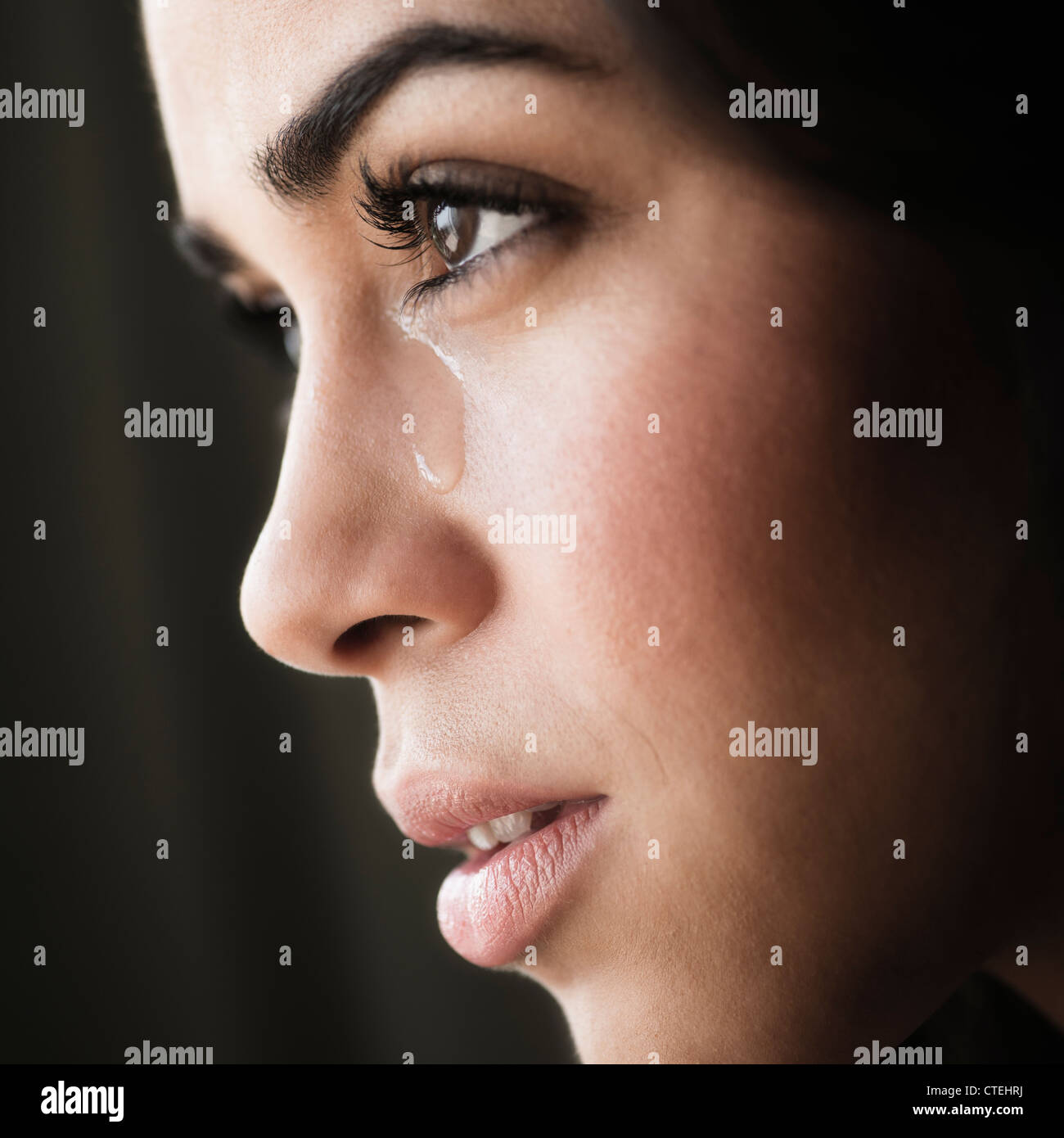 Close-up of young woman crying Stock Photo