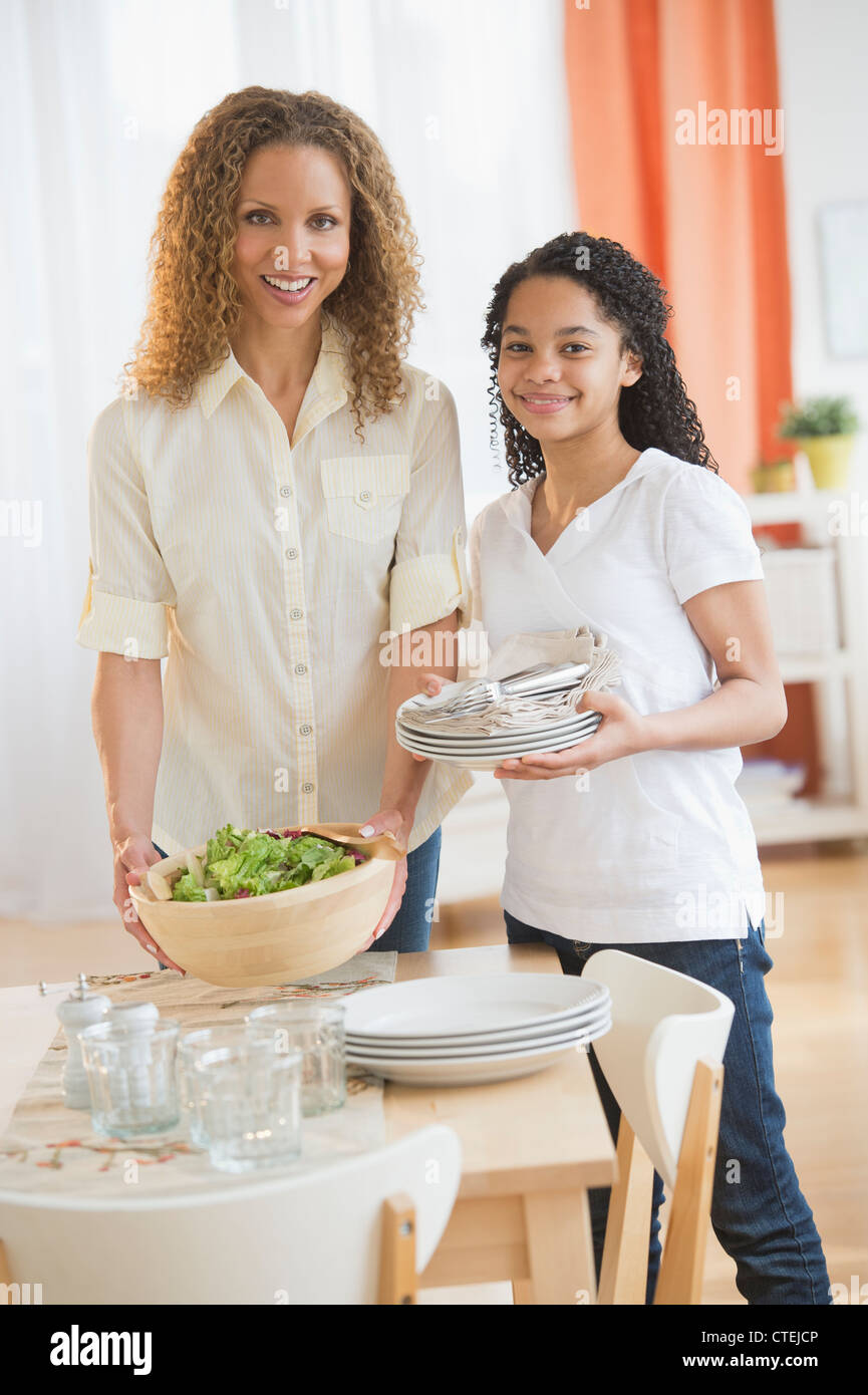 Child setting table chores hi-res stock photography and images - Alamy