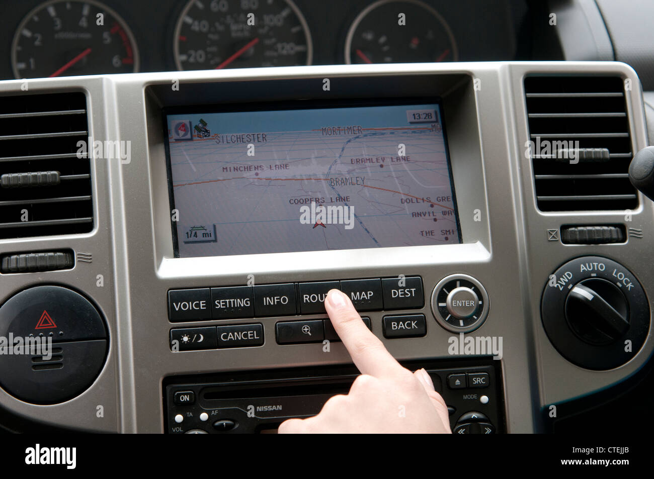 Setting up a Sat Nav device in a car Stock Photo