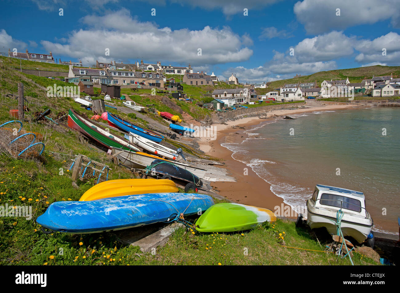 Colourful small boats at Collieston on the Aberdeenshire north East coast.  SCO 8248 Stock Photo