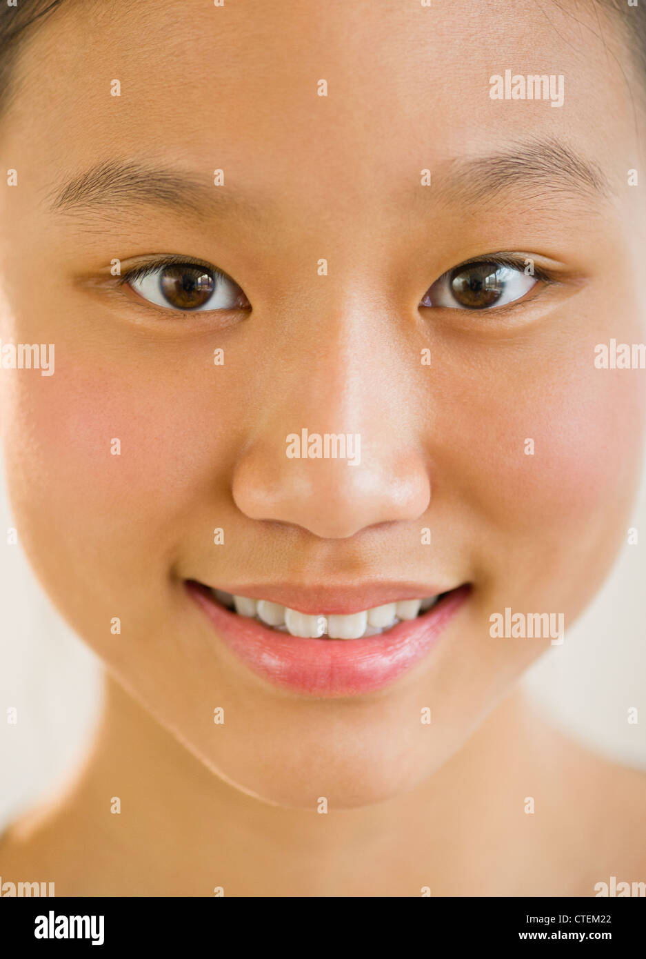Portrait of girl (14-15) smiling Stock Photo