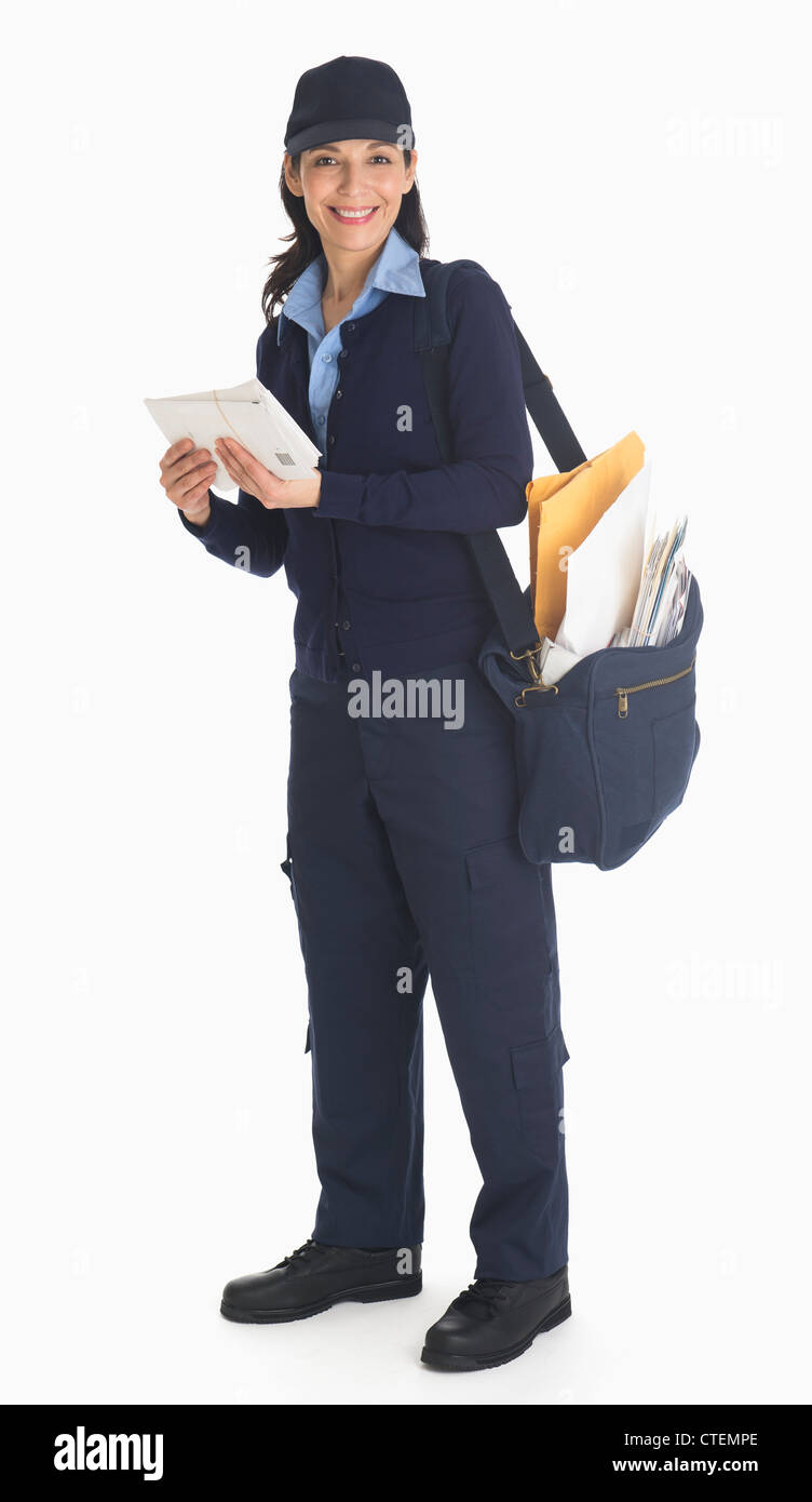 Studio shot of female postal worker Stock Photo