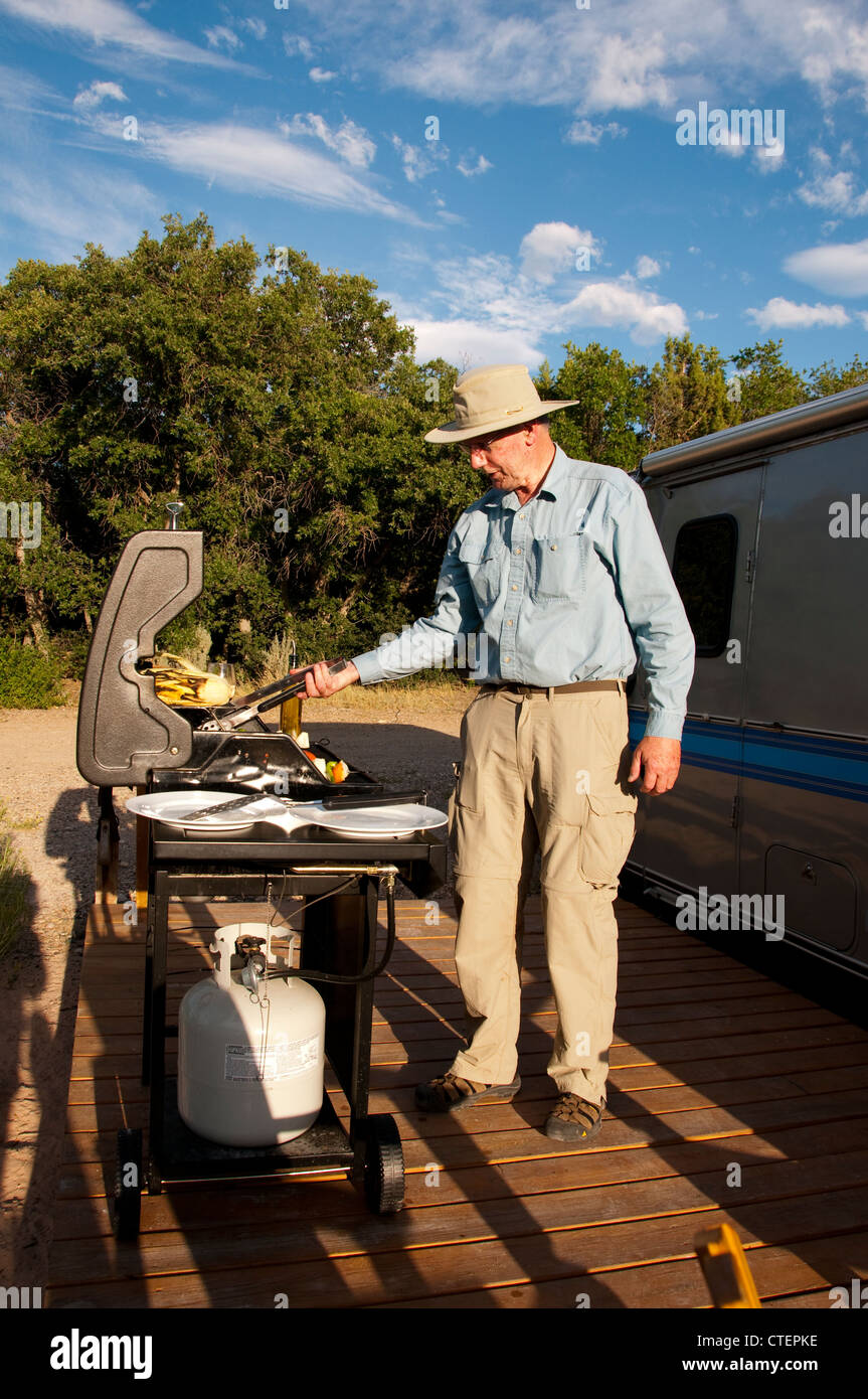USA, Utah, grilling dinner at classic Airstream travel trailers