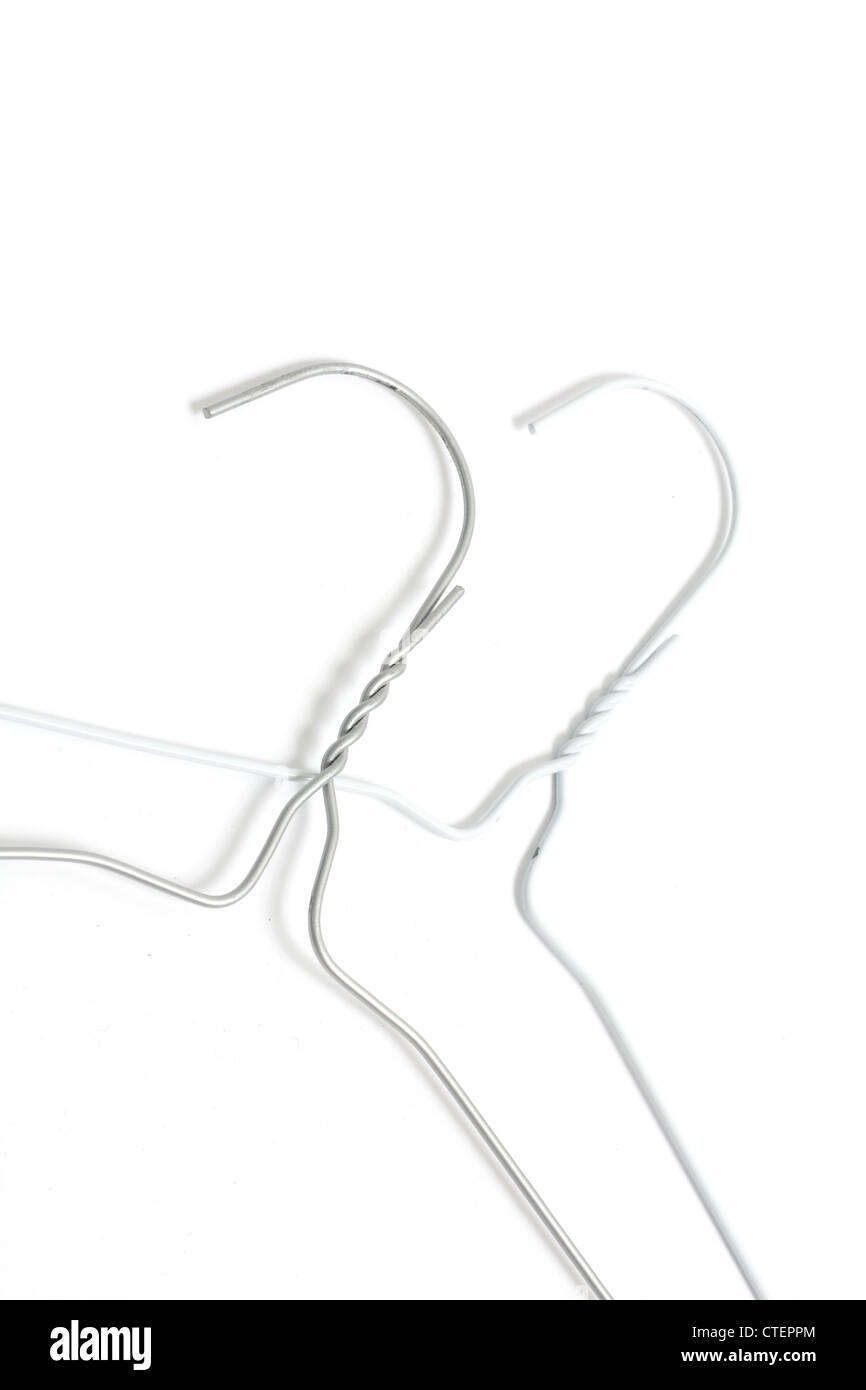 Coat hangers white wire hi-res stock photography and images - Page 2 - Alamy