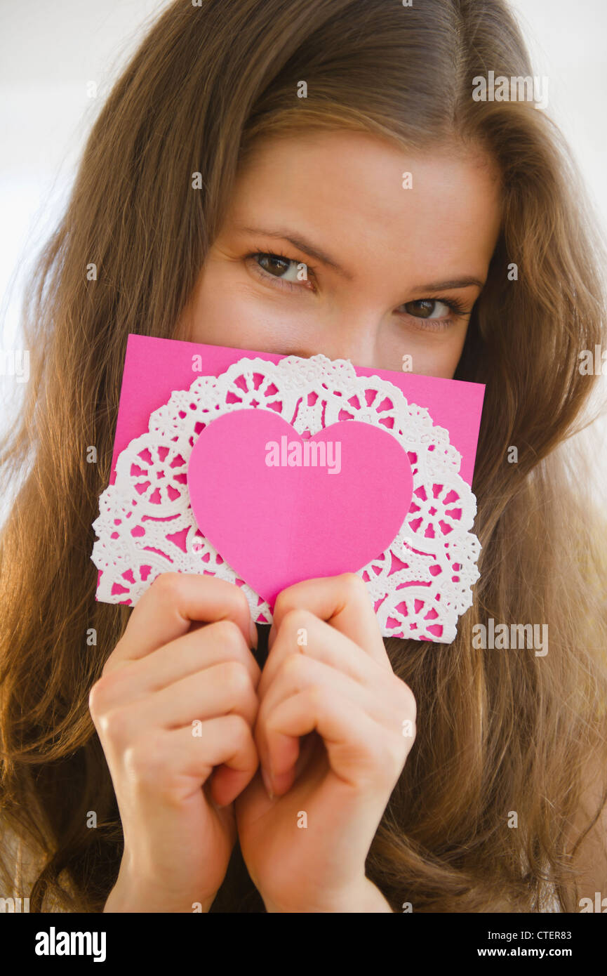 USA, New Jersey, Jersey City, Woman holding valentine card Stock Photo