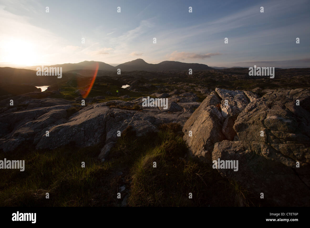 Isle of Harris, Scotland. Silhouetted sunset view over Harris’s hills and mountains. Stock Photo