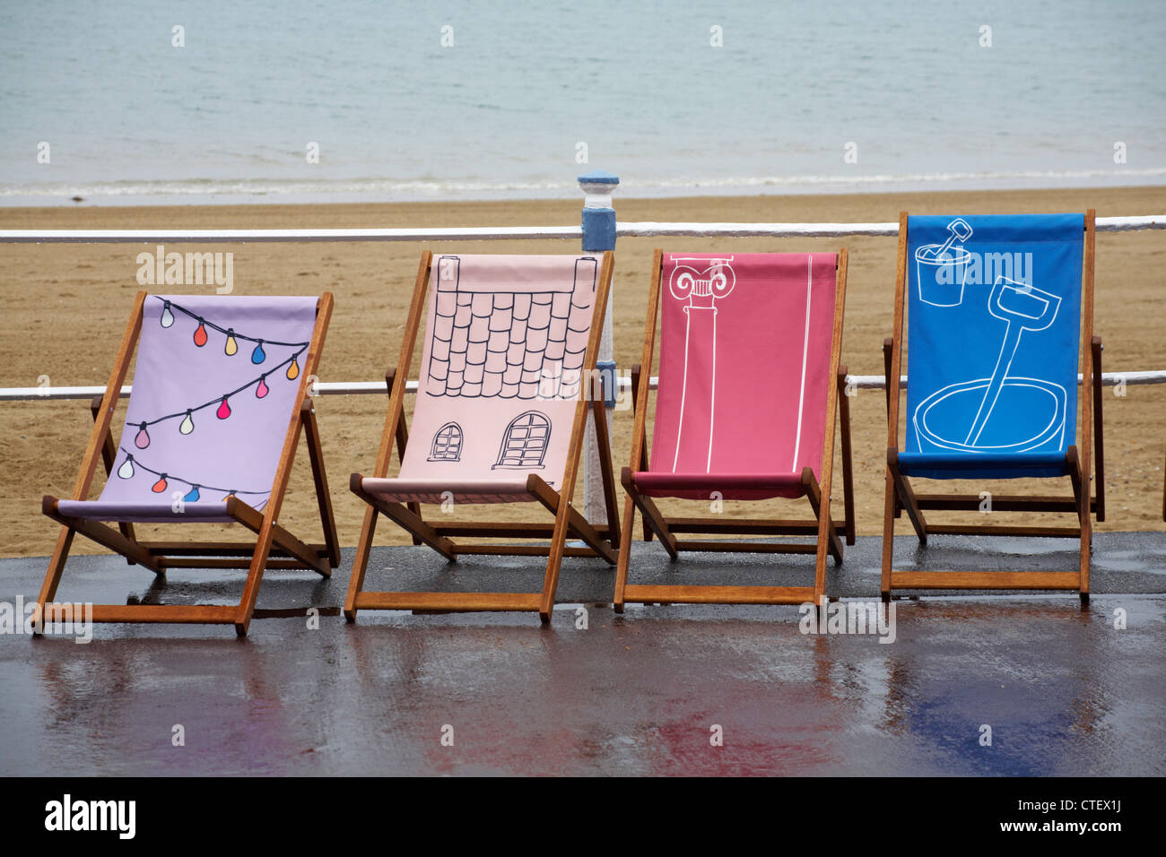 Weymouth Esplanade is decorated with 500 deckchairs, deck chairs, designed by locals at Weymouth
