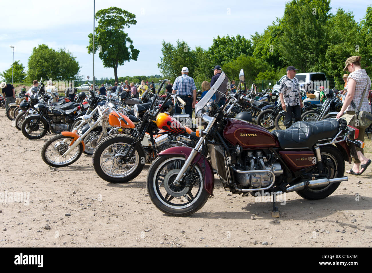 Various motorcycles Harley-Davidson and Honda Gold Wing GL 1100 in the foreground Stock Photo