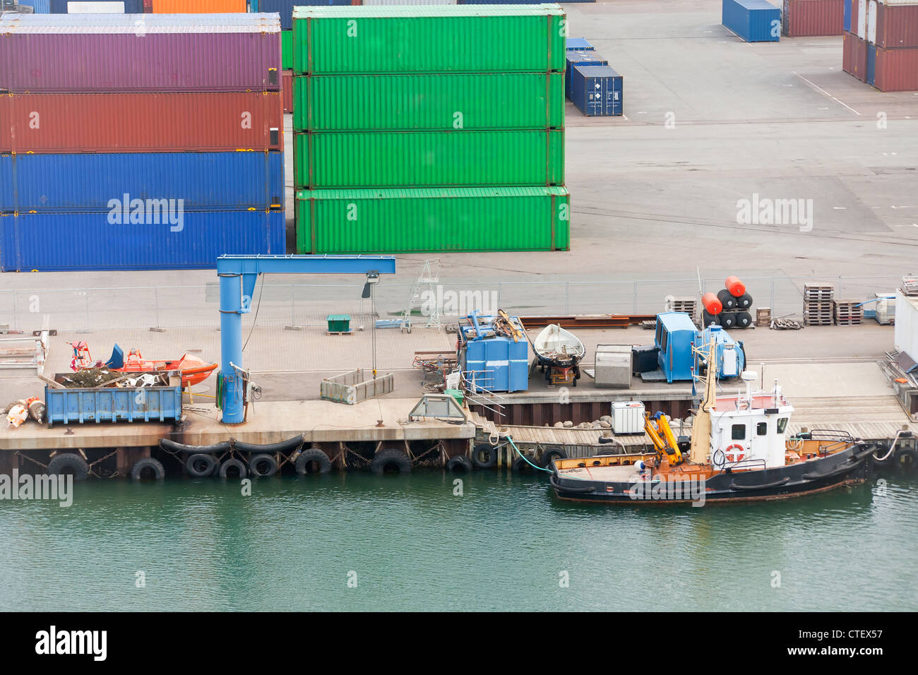 boat and freight containers in cargo port , Copenhagen Stock Photo Alamy