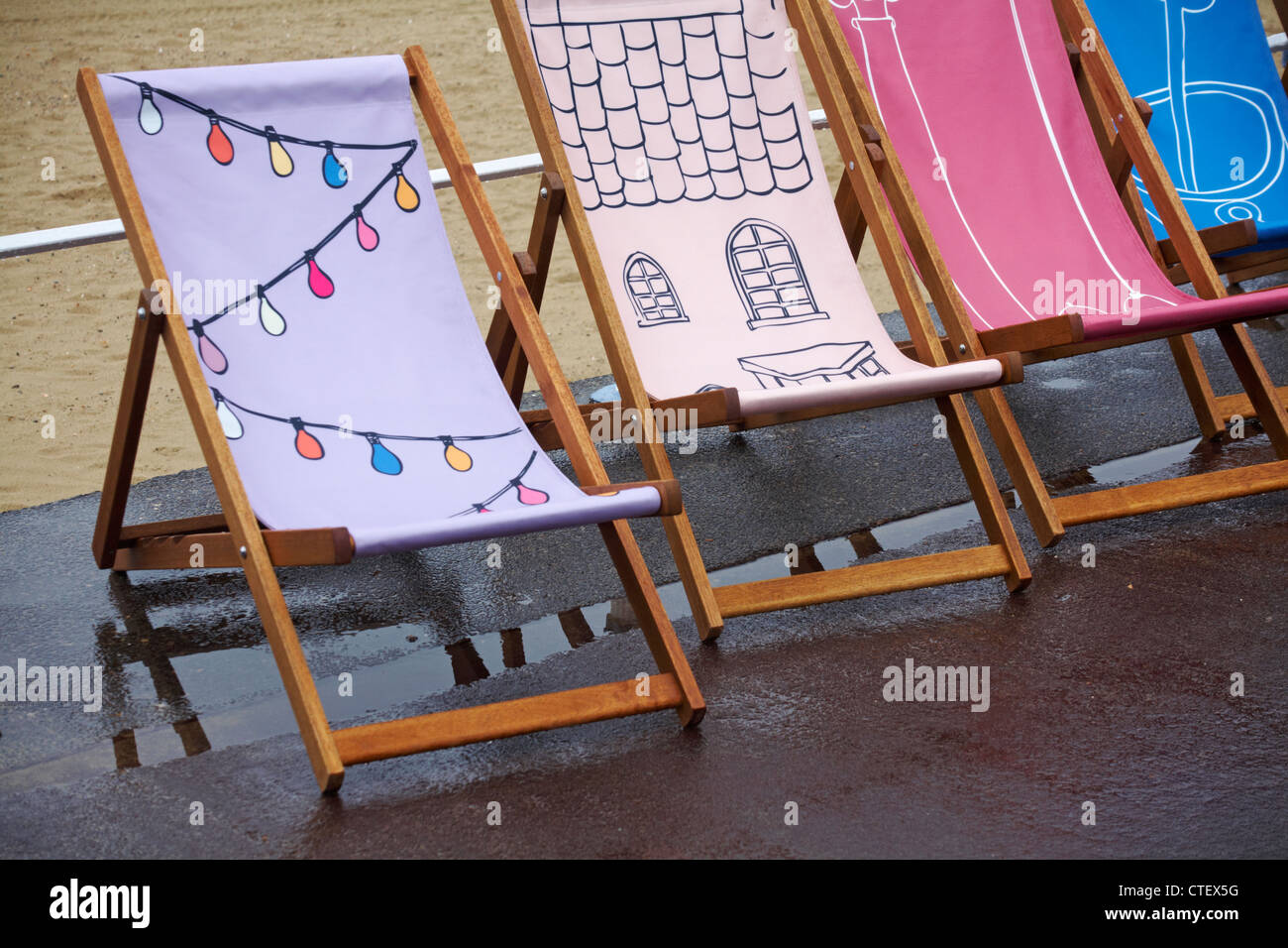 Weymouth Esplanade is decorated with 500 deckchairs, deck chairs, designed by locals at Weymouth
