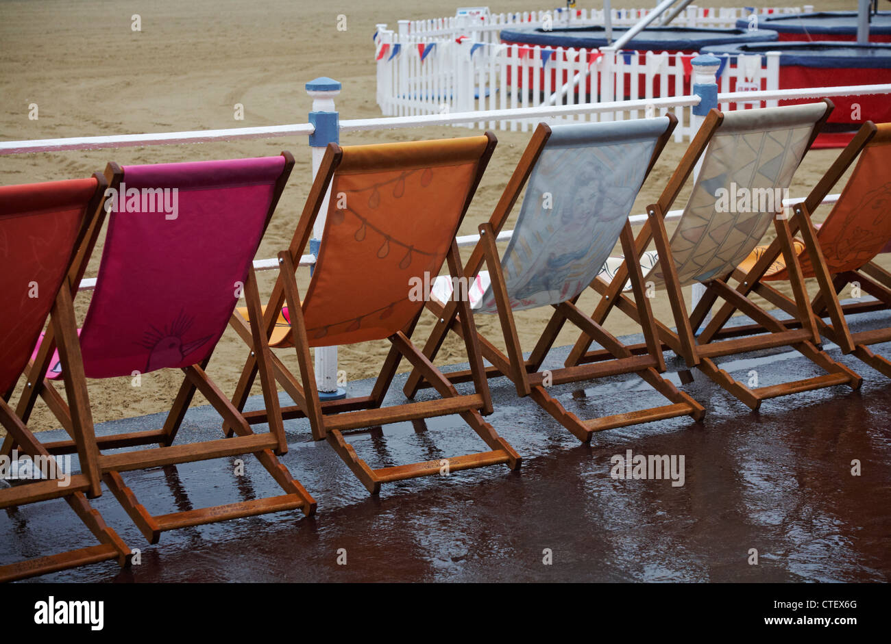 Weymouth Esplanade is decorated with 500 deckchairs, deck chairs, designed by locals at Weymouth