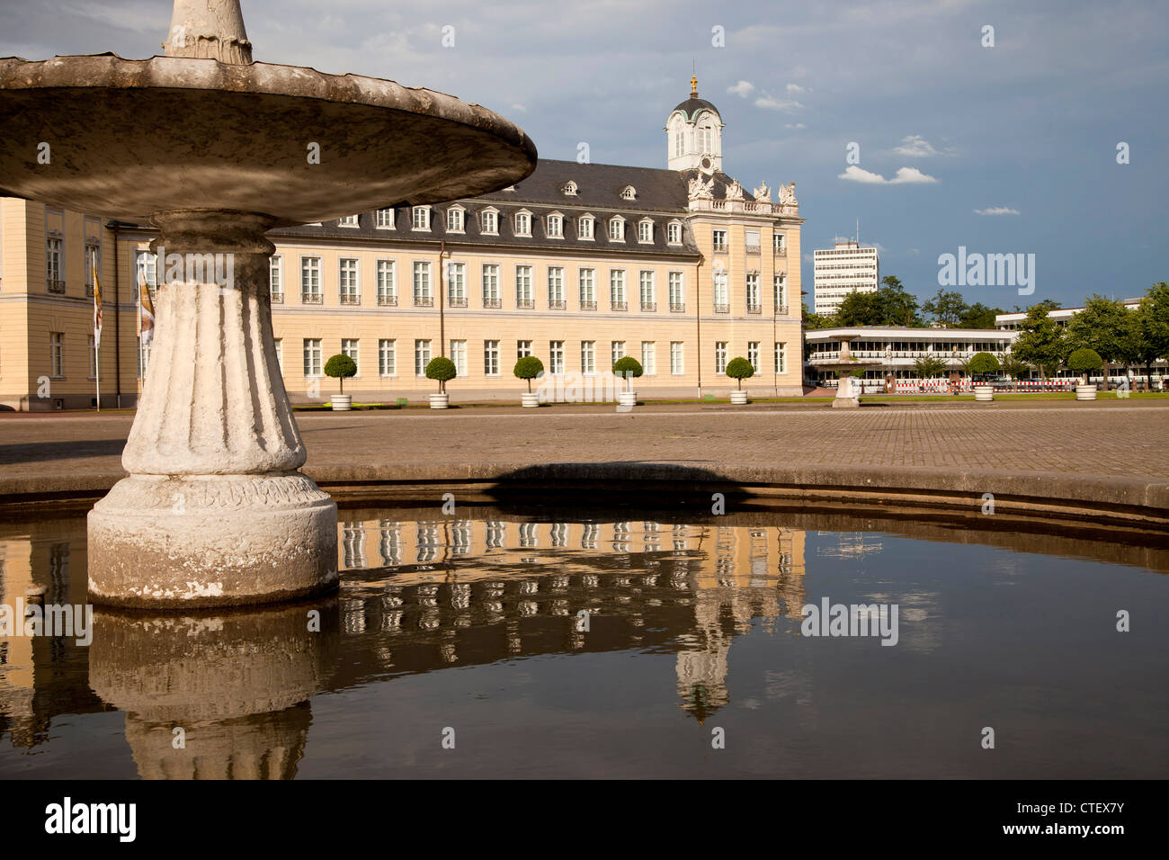 fountain and Karlsruhe Palace in Karlsruhe, Baden-Württemberg, Germany Stock Photo