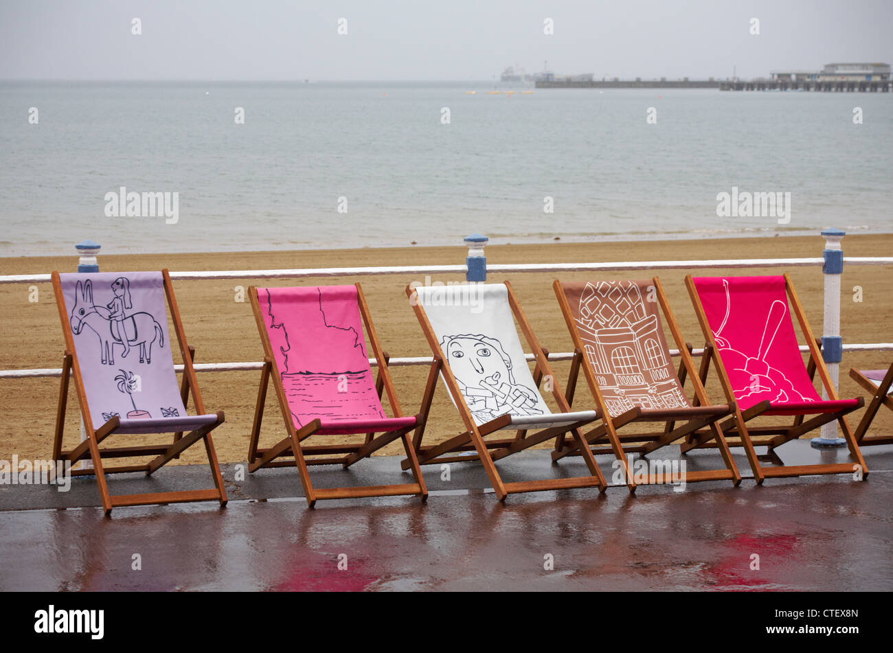 Weymouth Esplanade is decorated with 500 deckchairs, deck chairs