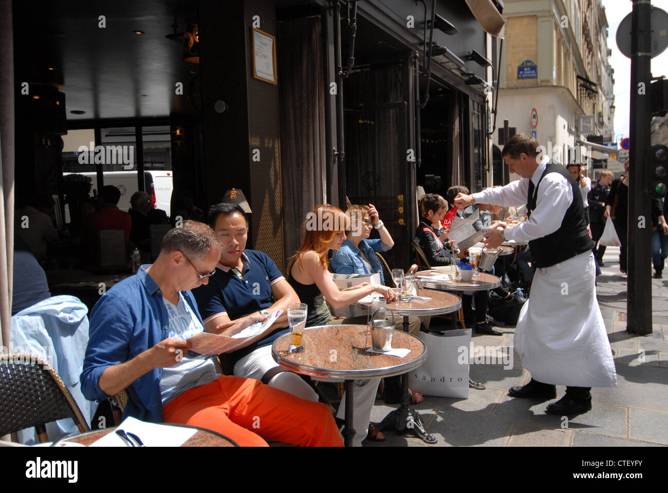 Outdoor dining on the Rue de Rivoli  Paris in summer Stock Photo