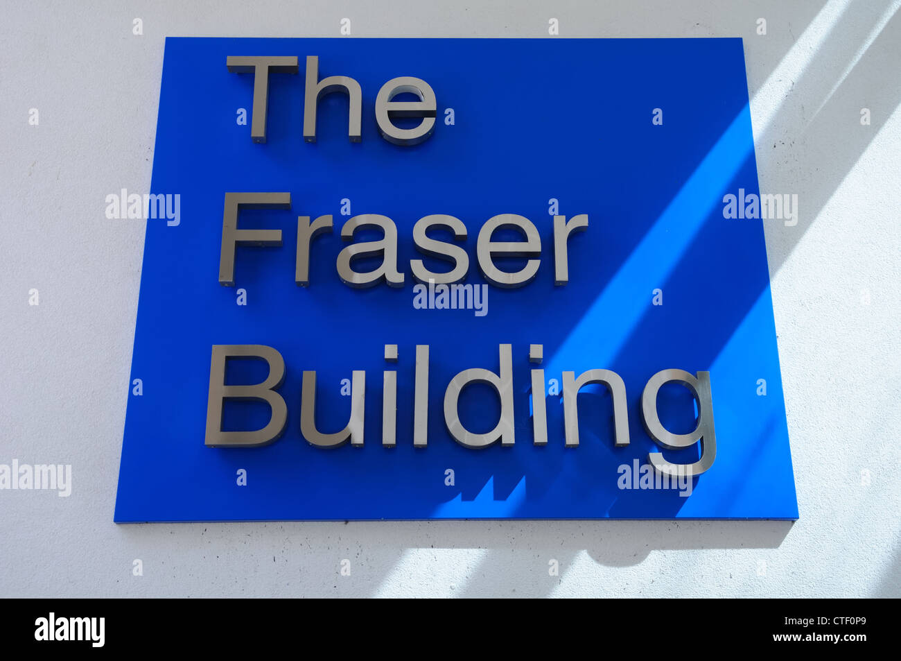 Sign at the entrance to the Glasgow University Fraser building. Stock Photo