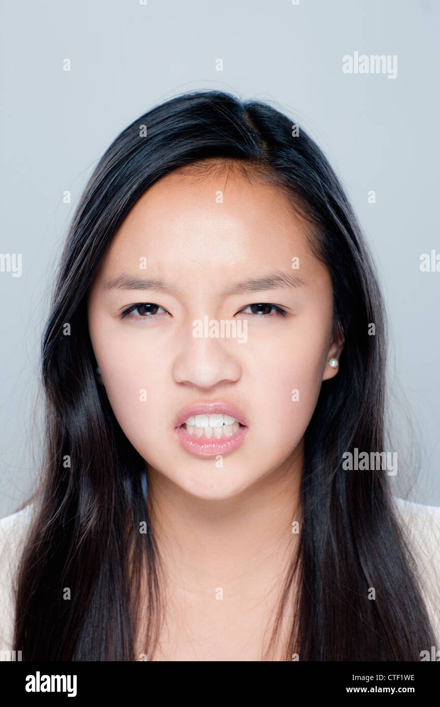 Portrait of teenage girl (14-15), studio shot Stock Photo - Alamy