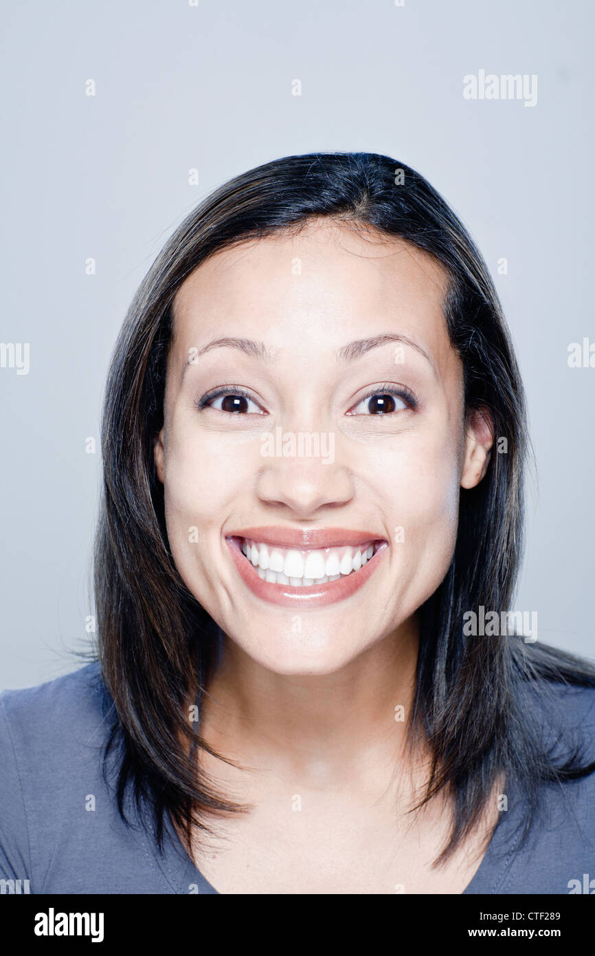 Portrait of happy young woman, studio shot Stock Photo - Alamy
