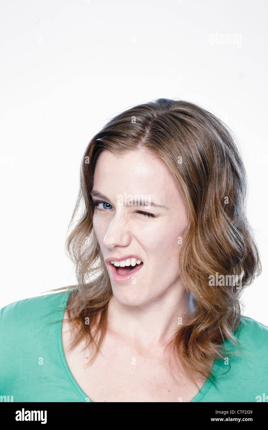 Blinking eye woman hires stock photography and images Alamy