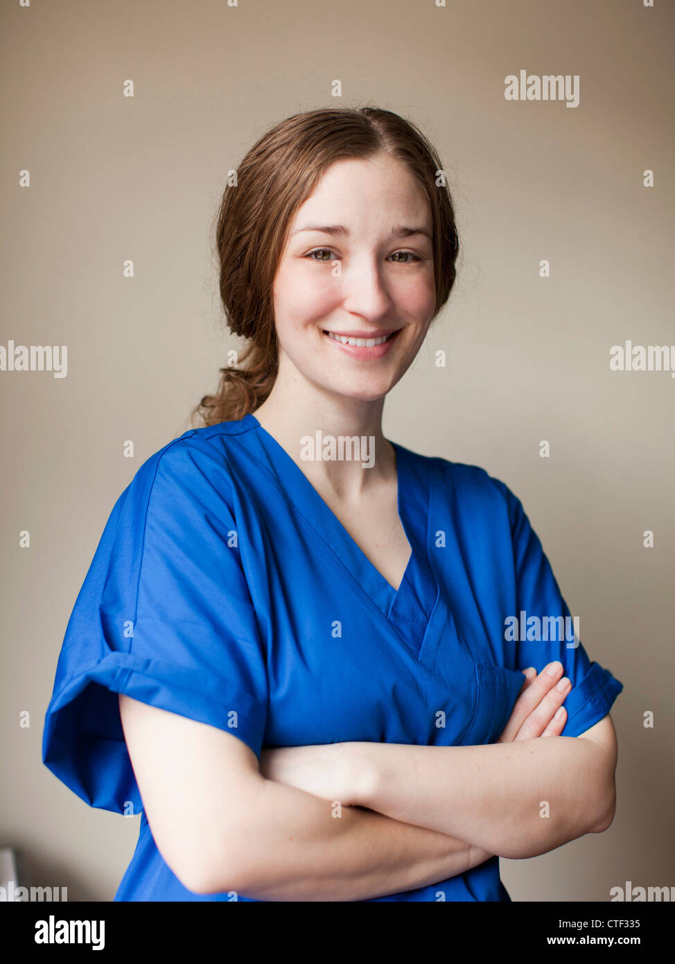 Female nurse blue uniform hi-res stock photography and images - Alamy