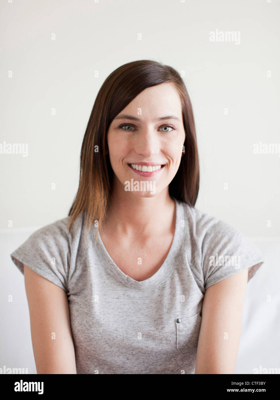 Portrait of happy young woman Stock Photo - Alamy