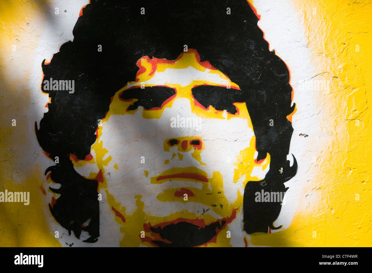 Painting of Maradona on a playground wall near La Bombonera in La Boca, Buenos Aires, Argentina Stock Photo