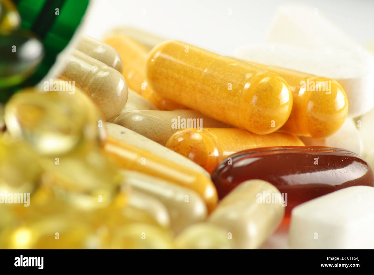 Composition with dietary supplement capsules and containers. Variety of