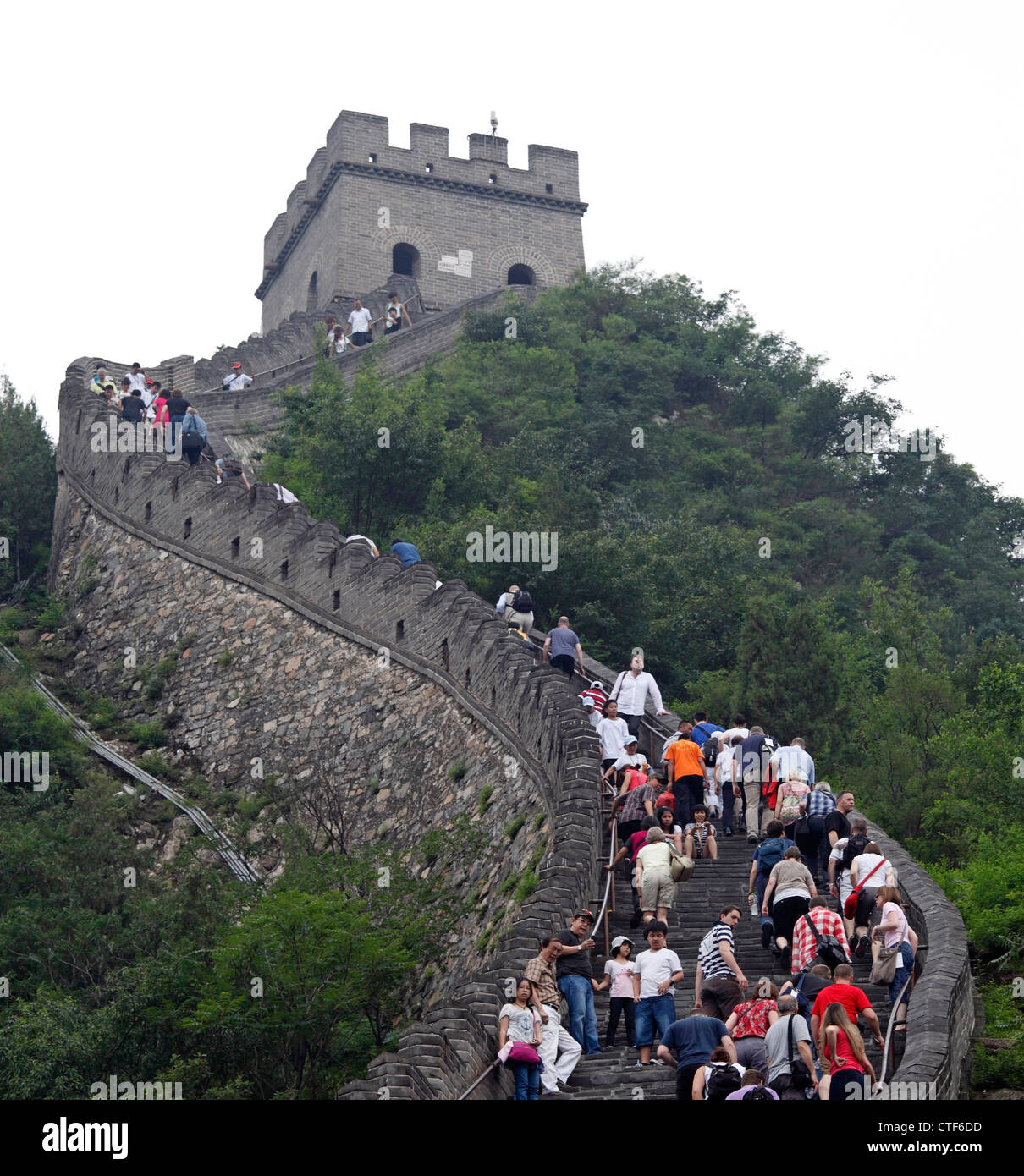 people climbing the Great Wall in China Stock Photo