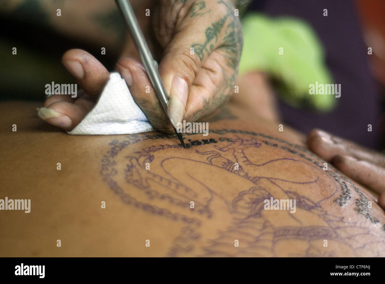 Sak Yan master,Ajahn Chai, Bangkok, Thailand. Sak Yan are the mystical tattoos popular in Thailand. Stock Photo