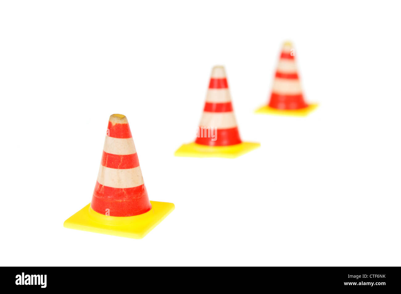 Row of road warning cones isolated on the white background Stock Photo