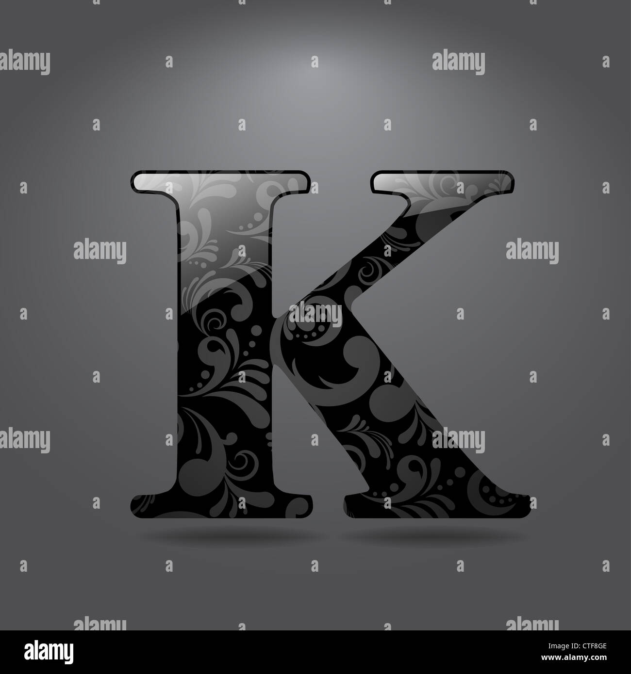 Glossy letter K isolated on gray background Stock Photo