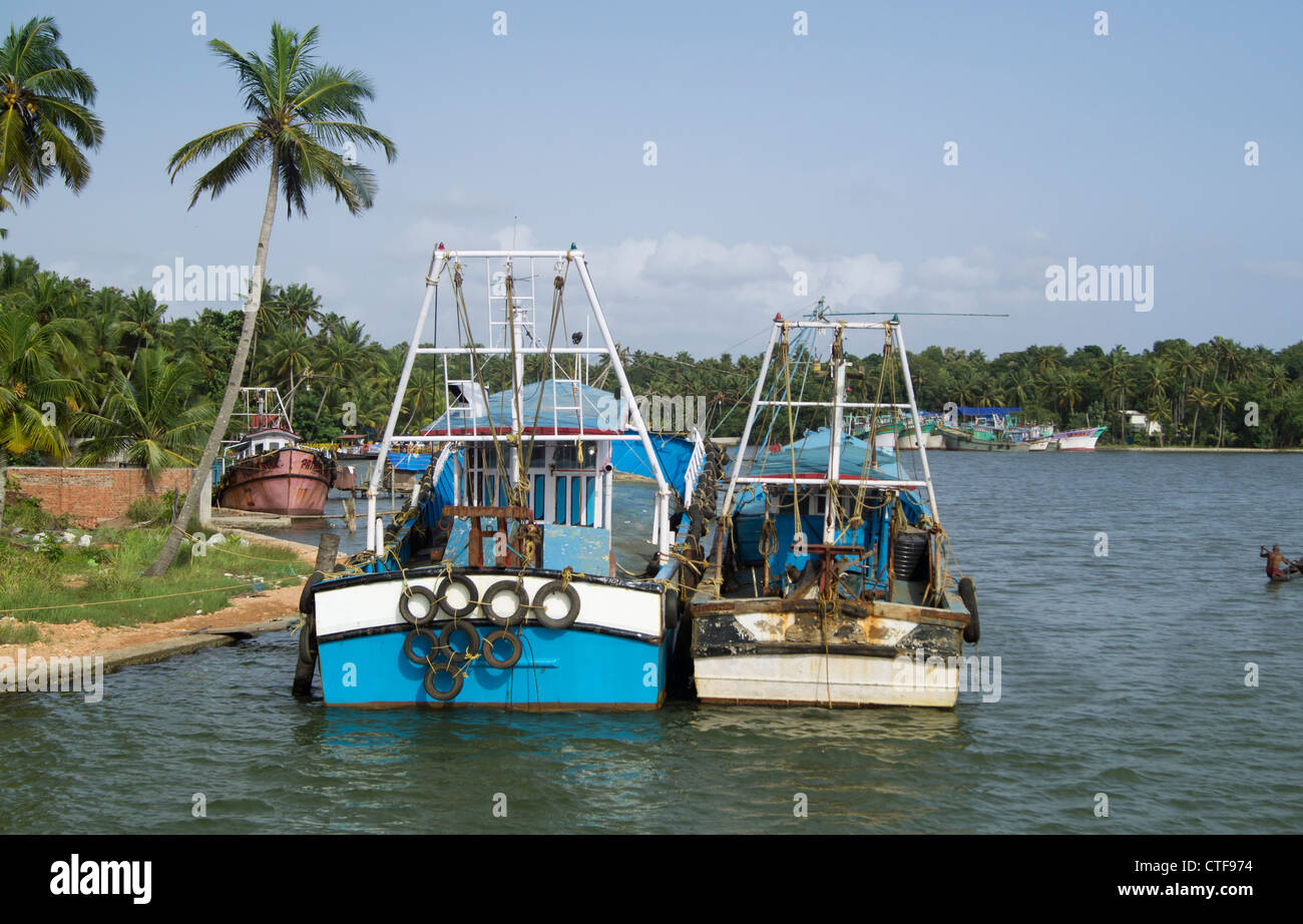 Fishing Boats on backwaters of alapuzha, Kerala Stock Photo