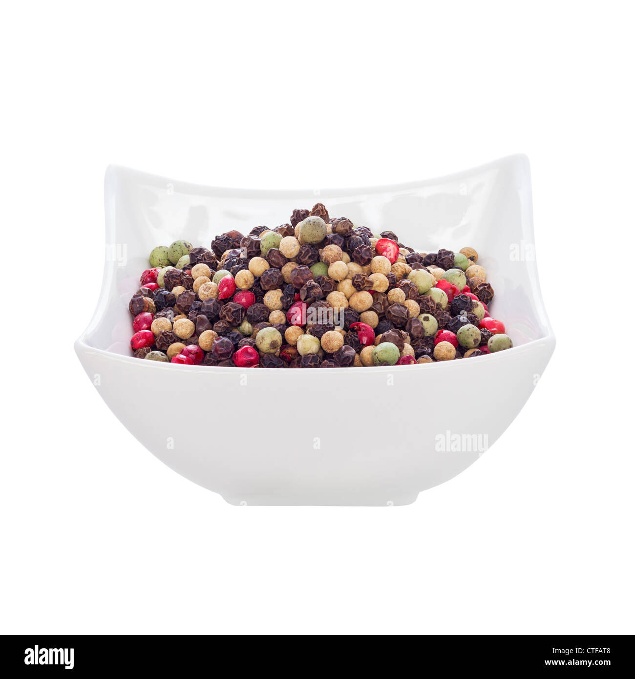 A small pot of gourmet mixed peppercorns. Fully in focus, front to back. Stock Photo