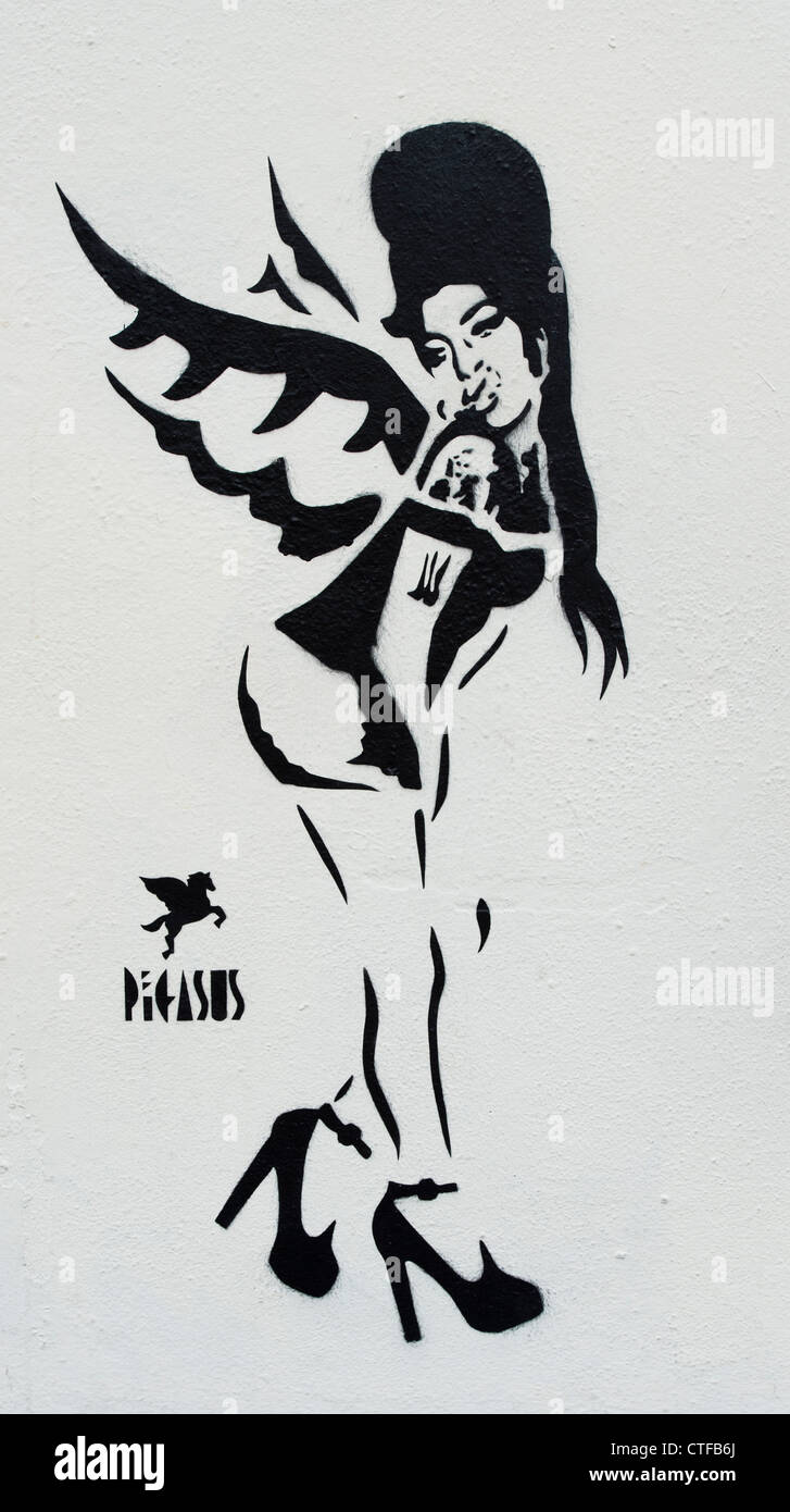 Amy Winehouse Angel stencil street graffiti. Camden Town. London Stock Photo