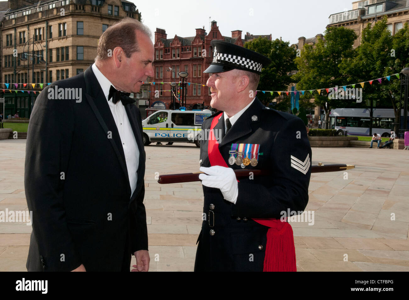West Yorkshire police chief constable Sir Norman Bettison talks to ceremonial sergeant Stock Photo