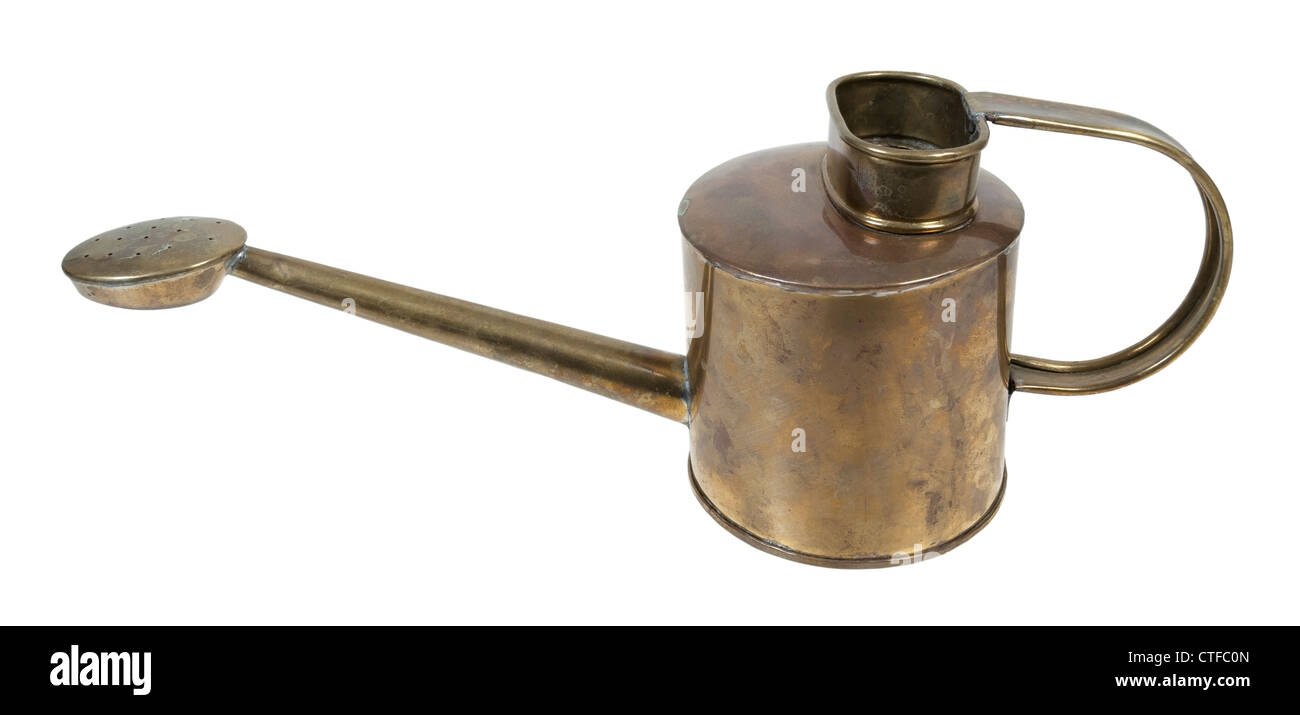Brass metal watering can for carrying water to bring life to the plants