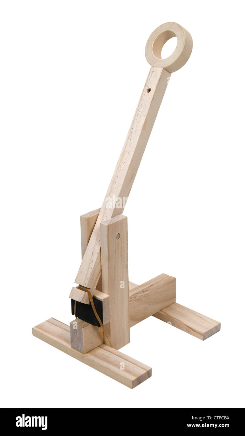 A wooden trebuchet used to throw objects at an opponent - path included Stock Photo