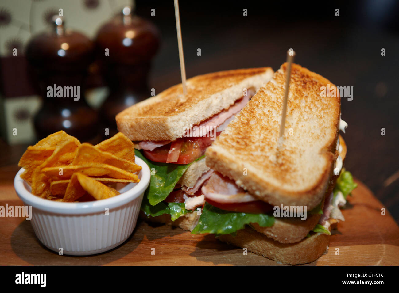 BLT toasted sandwich with nachos Stock Photo