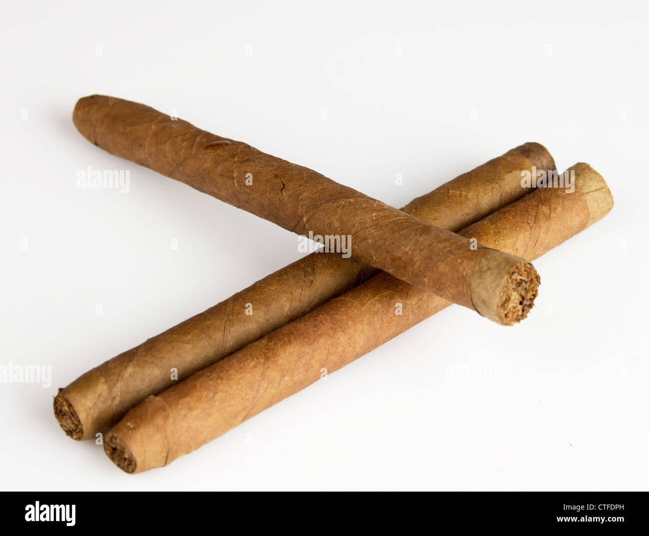 three cigars on white background Stock Photo