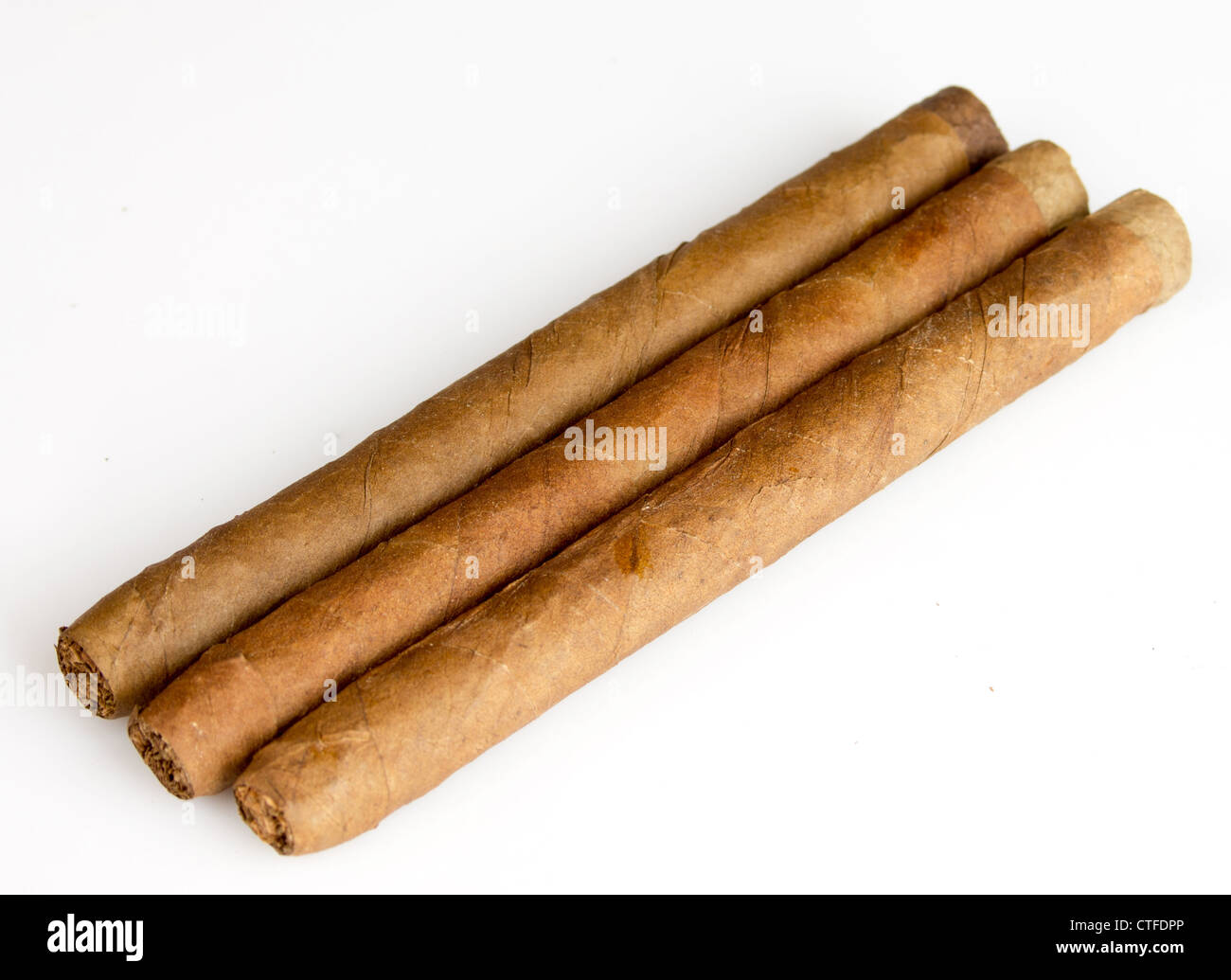 three cigars on white background Stock Photo