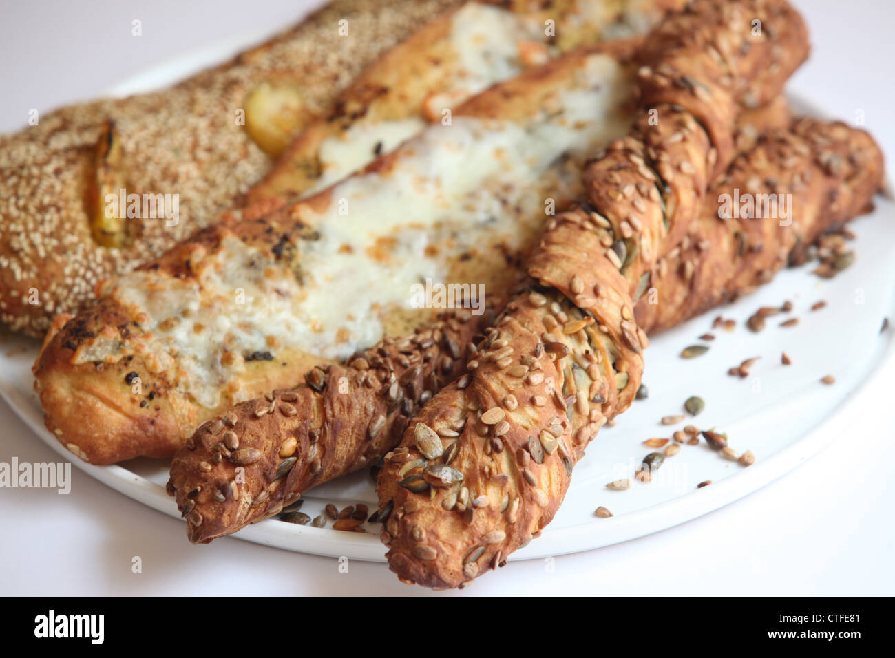 Breadsticks (grissini) selection of breadsticks topped with poppy seeds, sesame and herbs Stock