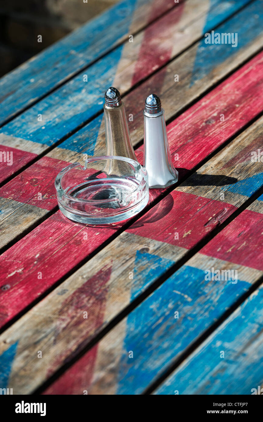 Union Jack cafe wooden table with condiments. Camden Market. London