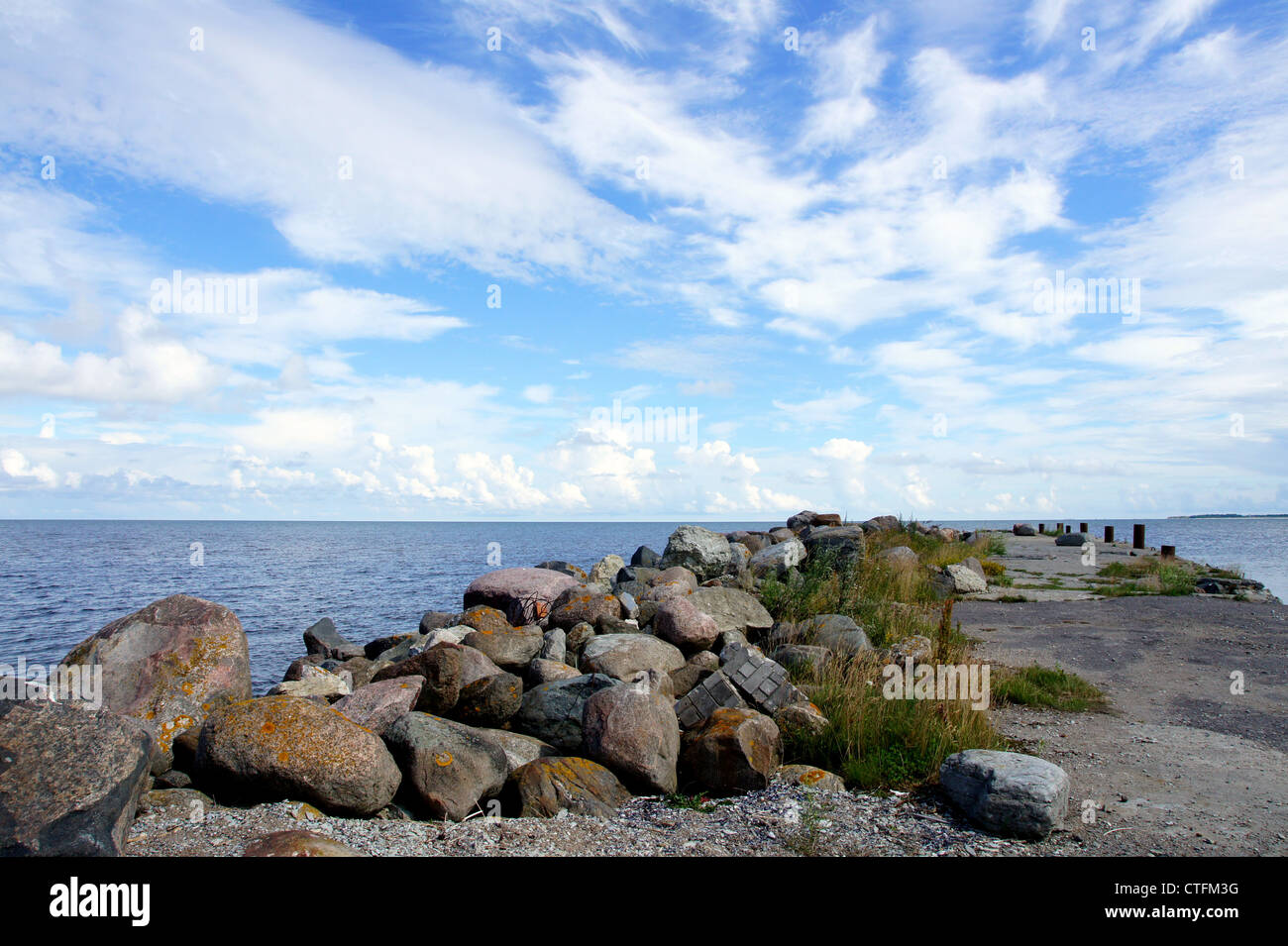 Stones on a background of the cloudy sky Stock Photo - Alamy