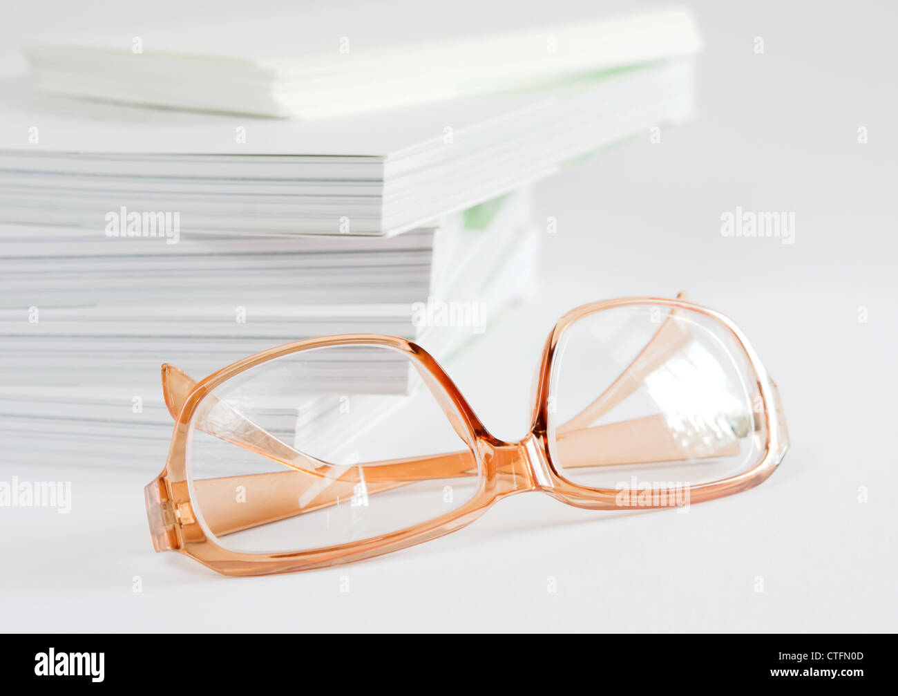 Photo of brown eyeglasses , relax from read a book Stock Photo Alamy