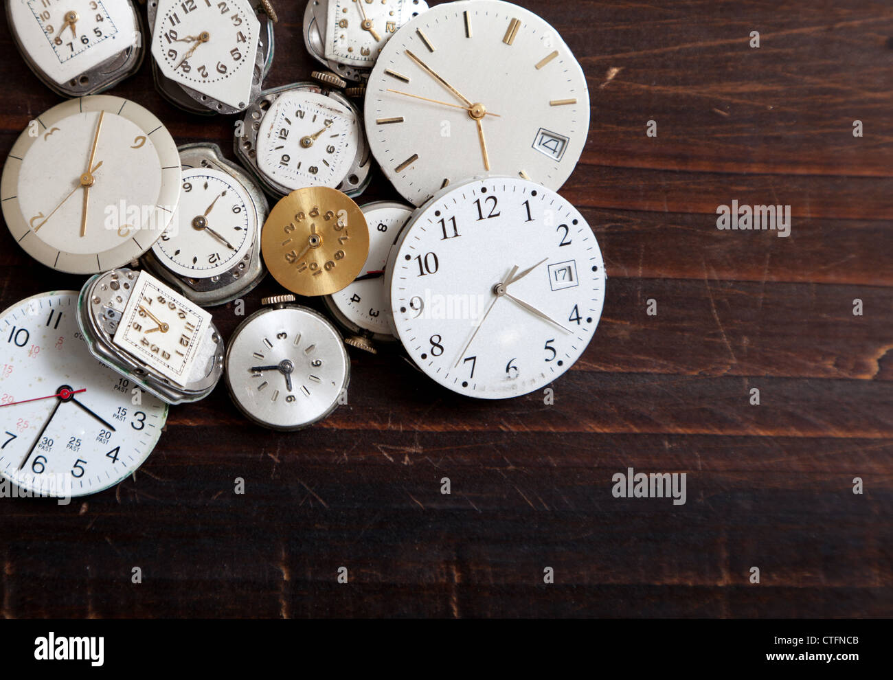 Assorted old, wrist watch faces creating a background Stock Photo